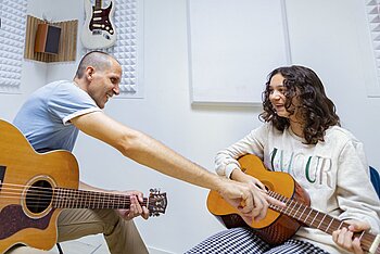 Illustratie bij Gitaarles